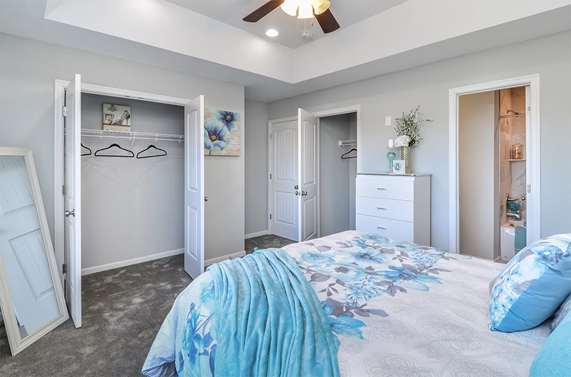 Master bedroom looking at closet and bathroom doors