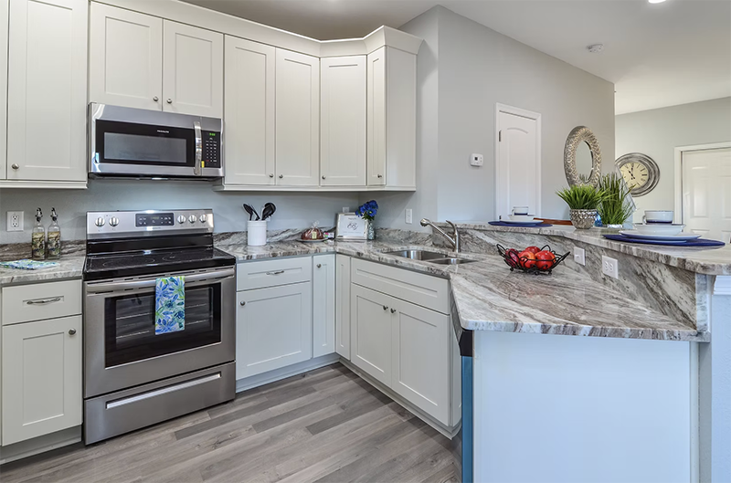 View into kitchen looking at oven