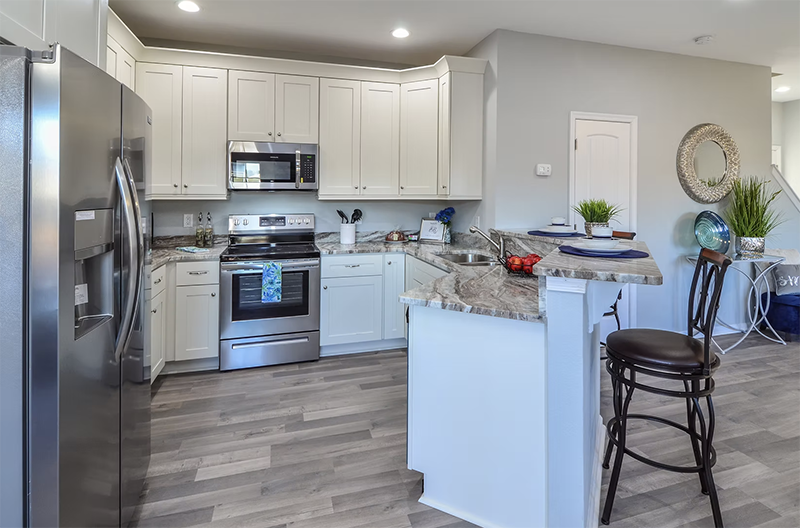 Looking into kitchen from dining space