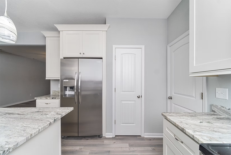 Looking into the kitchen view of refrigerator