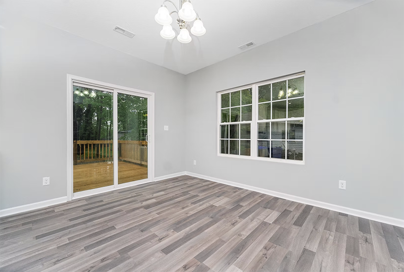 View of dining space and back sliding door