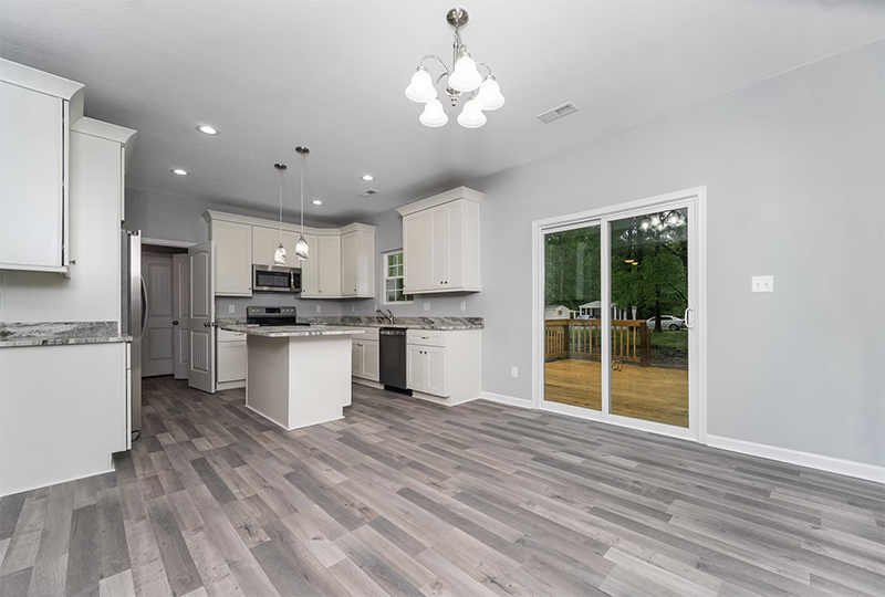 View of dining space and back sliding door