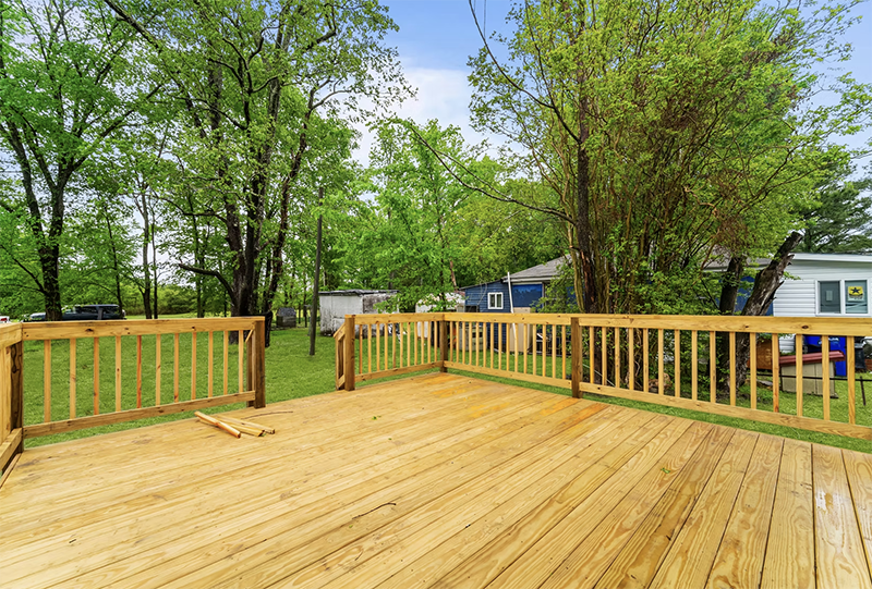View out of back sliding door onto the deck