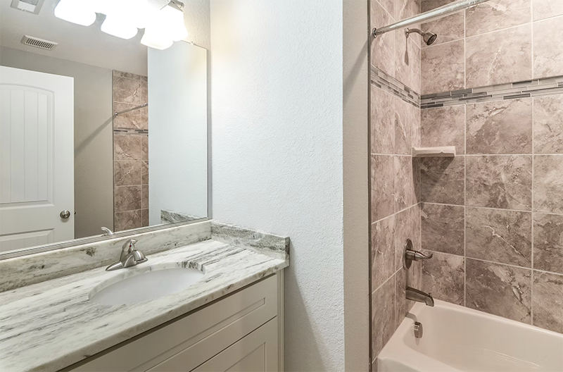 Bathroom looking at vanity and shower