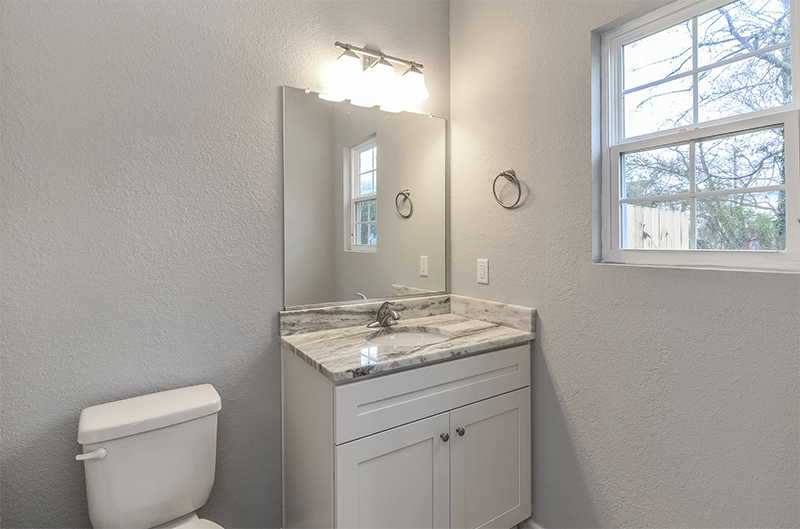 Bathroom view of vanity and toilet