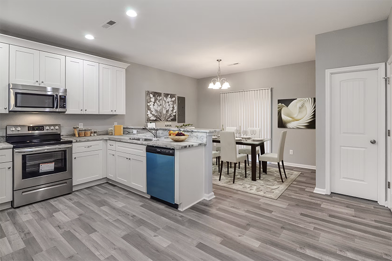 View into kitchen and dining space