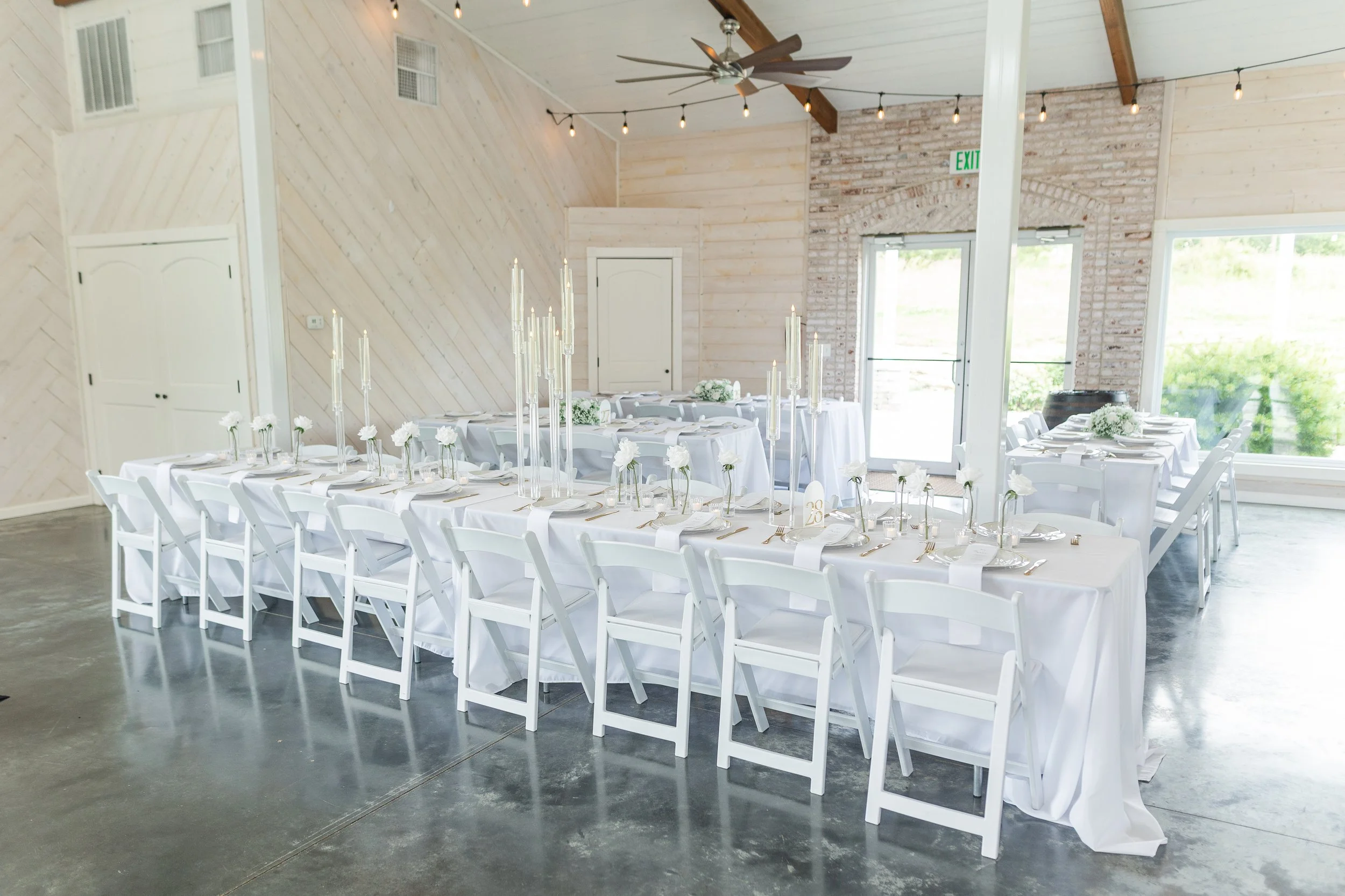 Classic white barn wedding venue at Pebble Creek Farm in Ste. Genevieve, Missouri, near St. Louis.