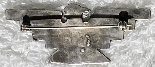 Fred Harvey era vintage Navajo Silver pin in a thunderbird shape