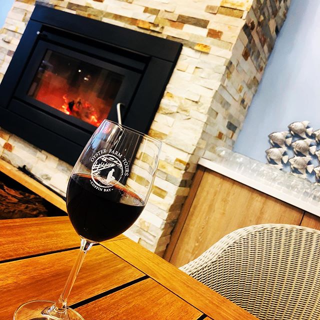 On a fresh drizzly day, enjoy a glass of red by our toasty wood fire after a delicious Oyster Farm Tour!  Now that&rsquo;s living!