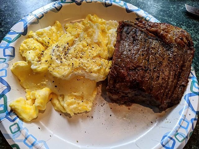 Steak and eggs with white cheddar cheese on a genuine, bona-fide ant free paper plate.