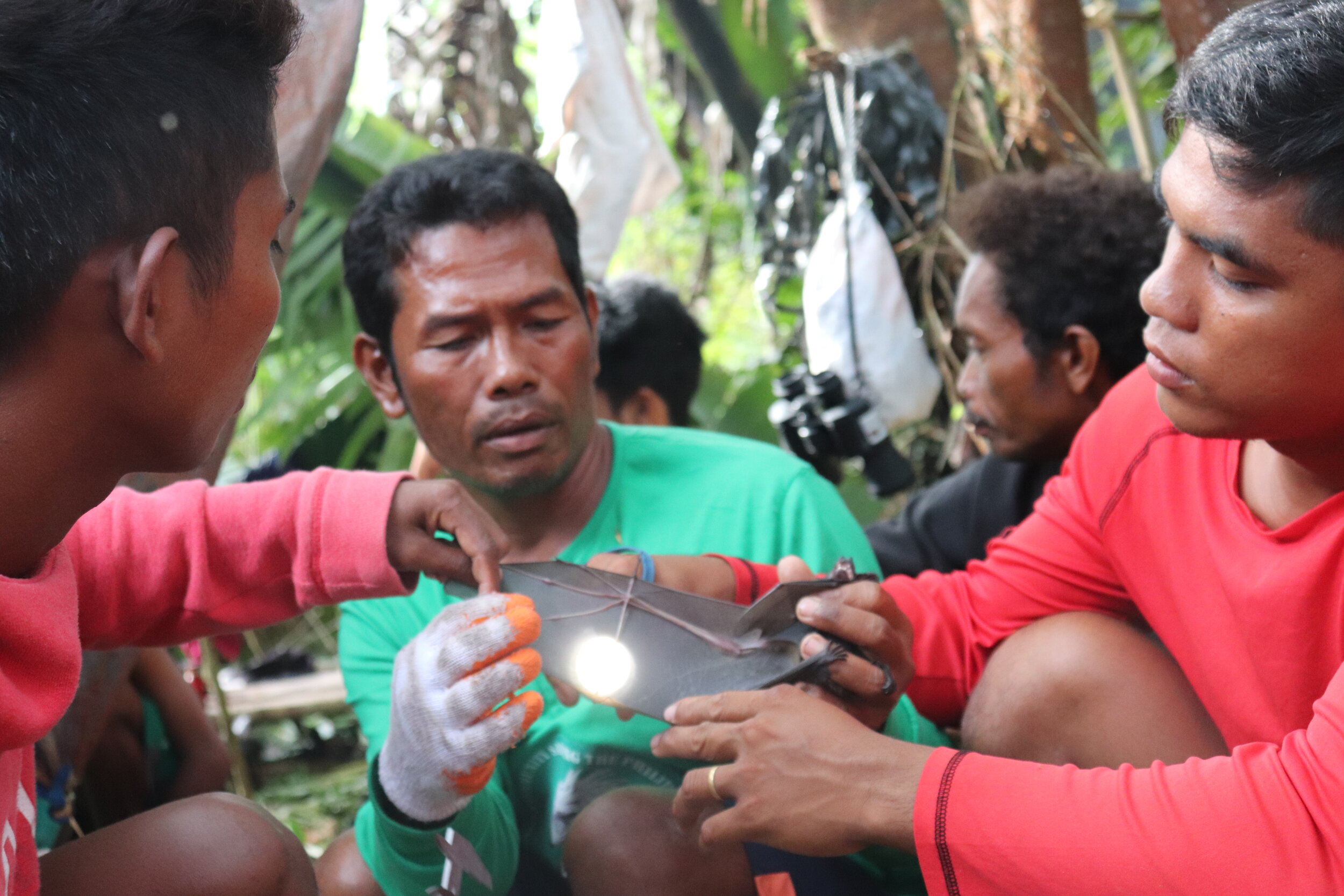 C.1 Dumagat tribe members learning bat biometrics during the training on Participatory Forest Resource Inventory.JPG