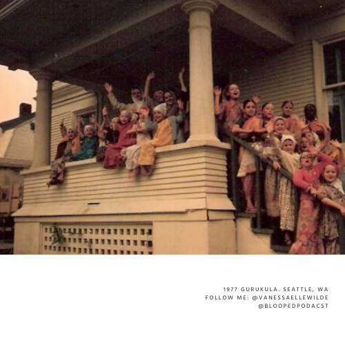 A group of children and a few adults on a porch, waving and smiling, with some sitting on the railing and others standing near the stairs, celebrating together.