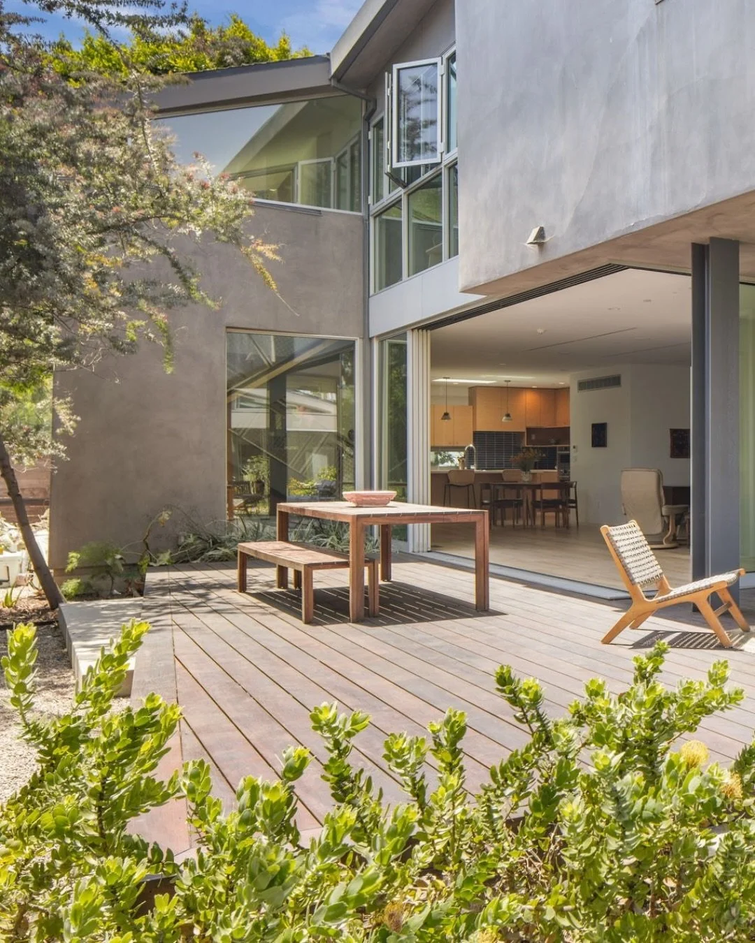 At Oak Street, the transition between indoors and outdoors feels seamless. The kitchen, living spaces, and backyard are thoughtfully connected, creating a home that feels open, relaxed, and easy to live in. Surrounded by layered gardens and mature la
