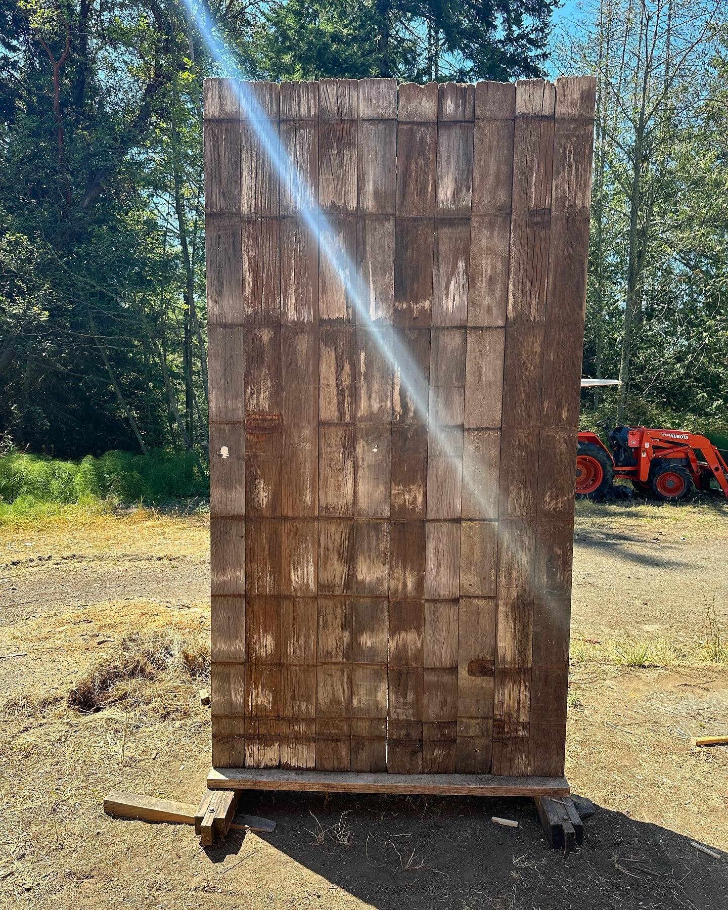 She stands gracefully now, and with ease.  A salvaged water tank made from old growth redwood - the sun beam a bonus just as I finished. 

This wall is part of my outdoor installation for the Orcas Island studio tour . All details in the earlier post