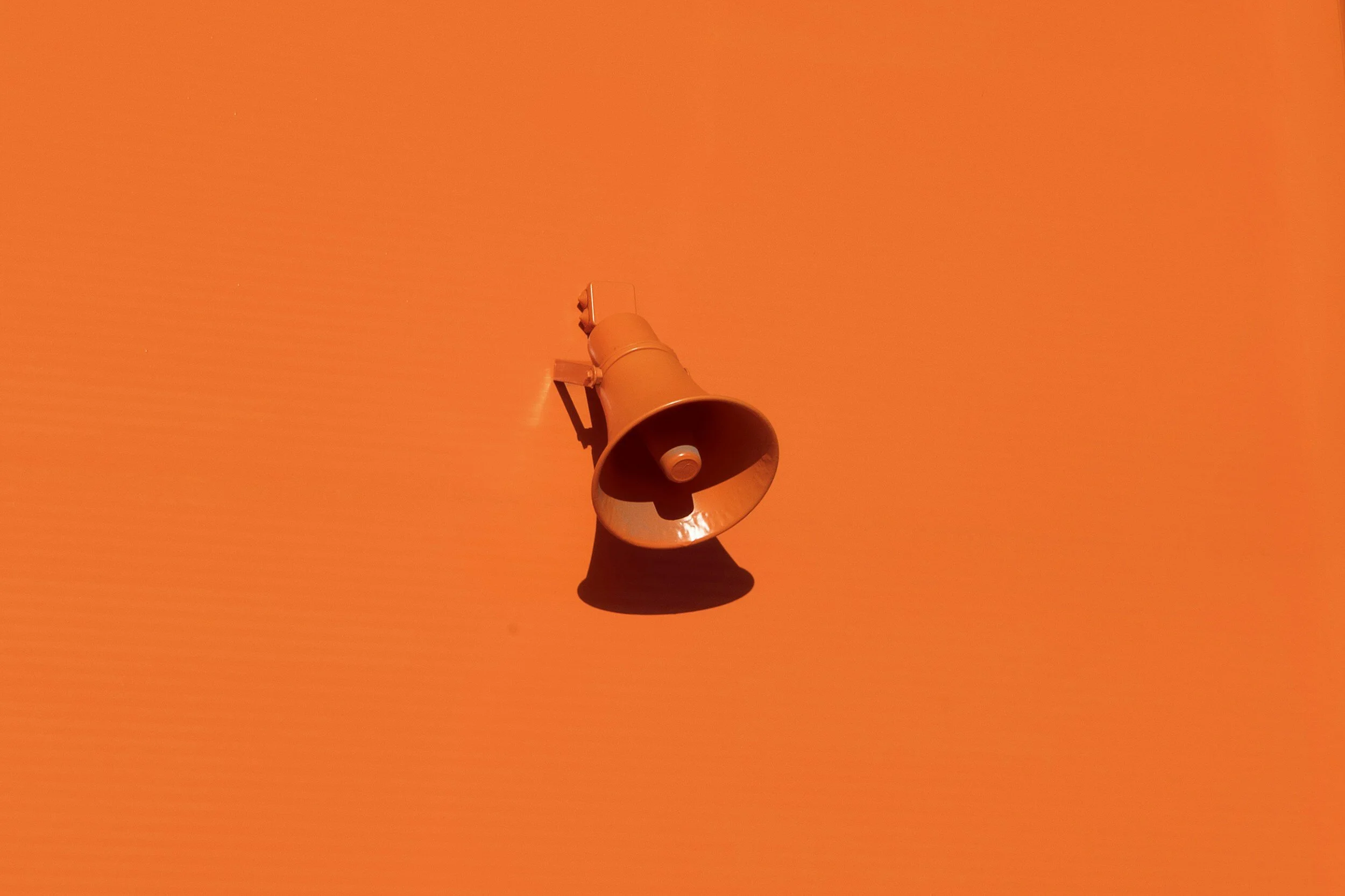A megaphone amplifying the impact of Public Relations (PR). Symbolizing the dissemination of strategic messages, fostering brand awareness, and driving effective communication in the PR landscape