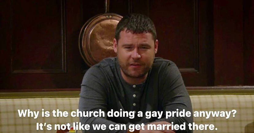 Why is the church doing a gay pride anyway? It’s not like we can get married there. 
#Emmerdale #PrideMonth
[ID Aaron is an early 30s butch gay man sat in the Woolpack pub saying this with a confused and disappointed look on his face. This wa
