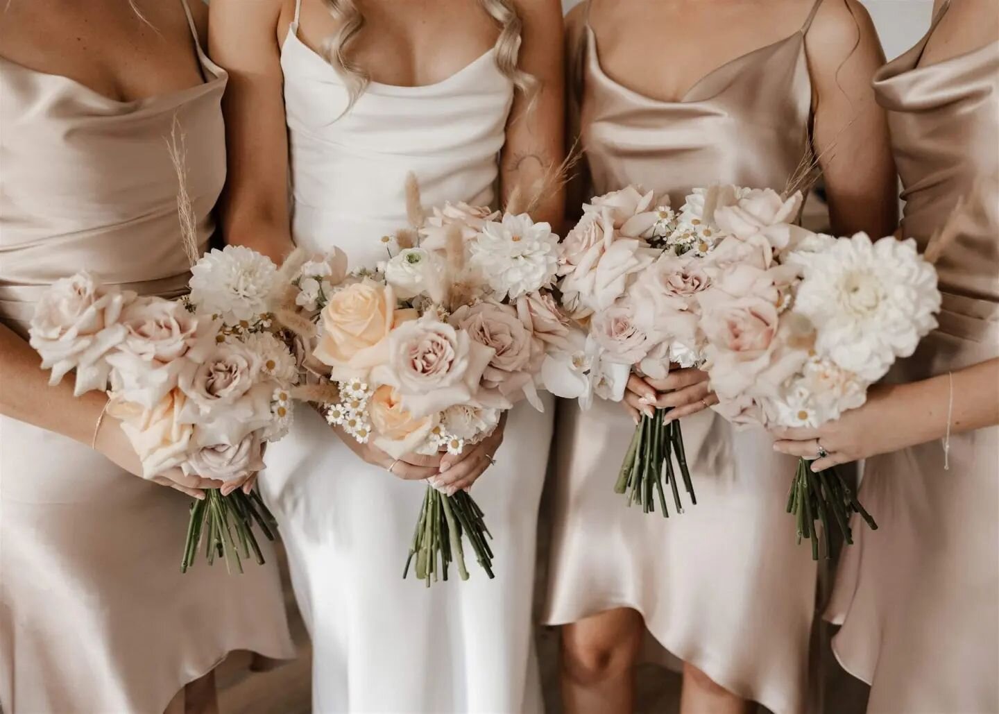 When the flowers match the dresses 🤍👏🏼 fresh florals with touches of dried bunny tails &amp; grasses throughout 🤍 for Grace &amp; her girls