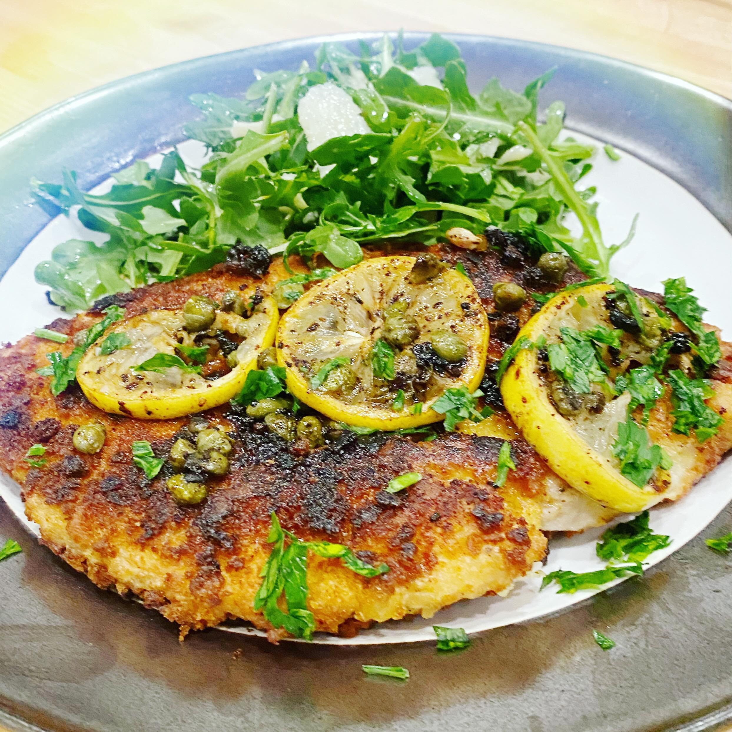 Chicken Milanese is basically Italian fried chicken&mdash;only better. I serve mine with a tangy lemon, caper, and wine reduction that layers flavor and cuts through the richness of the breading. This is traditionally served with an arugula salad, wi