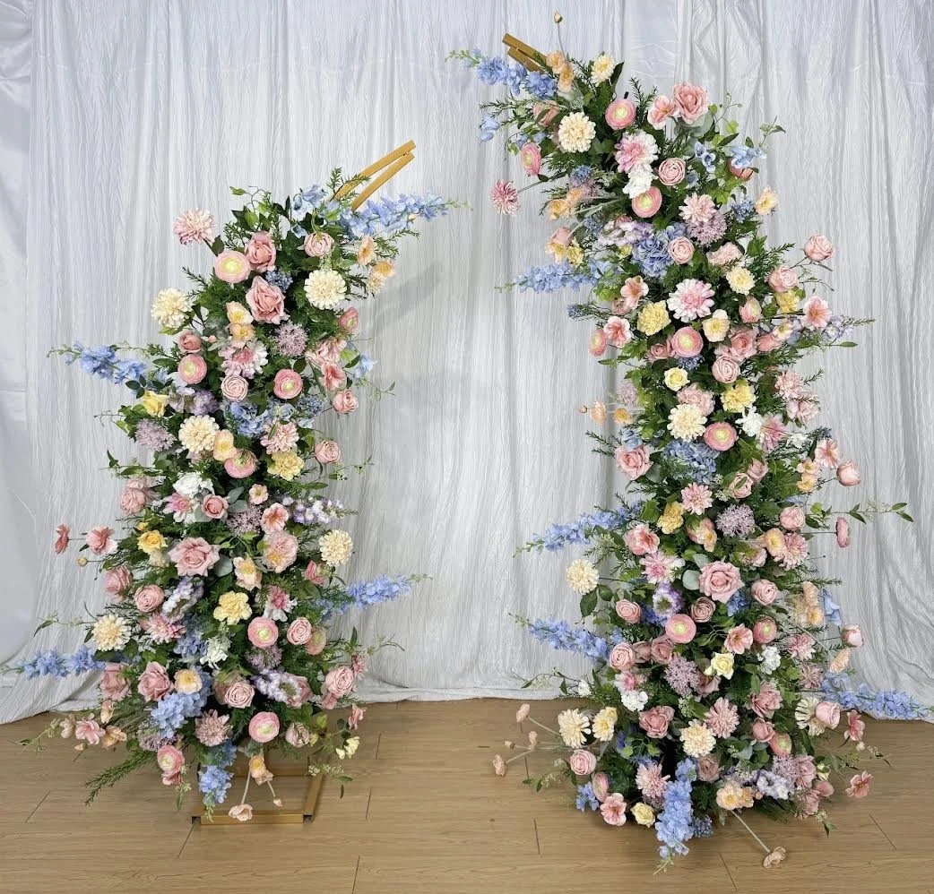 Wildflower 2 arches for behind the cake our ceremony backdrop