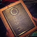 a plaque on the wall