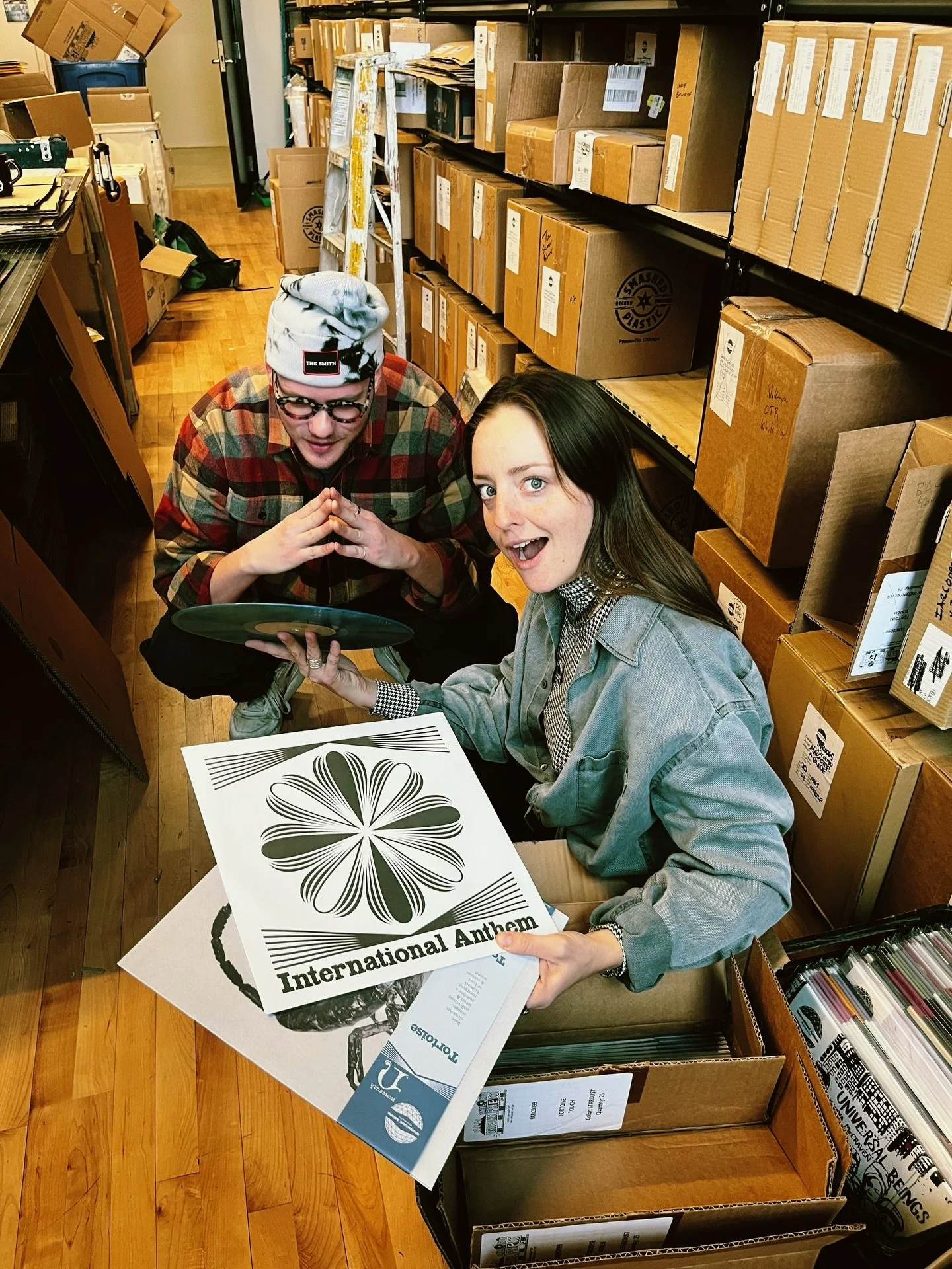 @calmquest and @briansylr hard at work shipping orders this @bandcamp Friday and WHOA they uncovered a lost box of 50 copies of @trts &rsquo;s Touch on limited edition Axial Seamount color vinyl!! Get it for 25% off today with code #TIGHT2025 !!