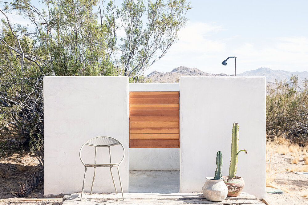 Fouders-of-Wonder-Valley-Jay-and-Alison-Carrols-outdoor-shower-shot-for-Architectural-Digest.jpg