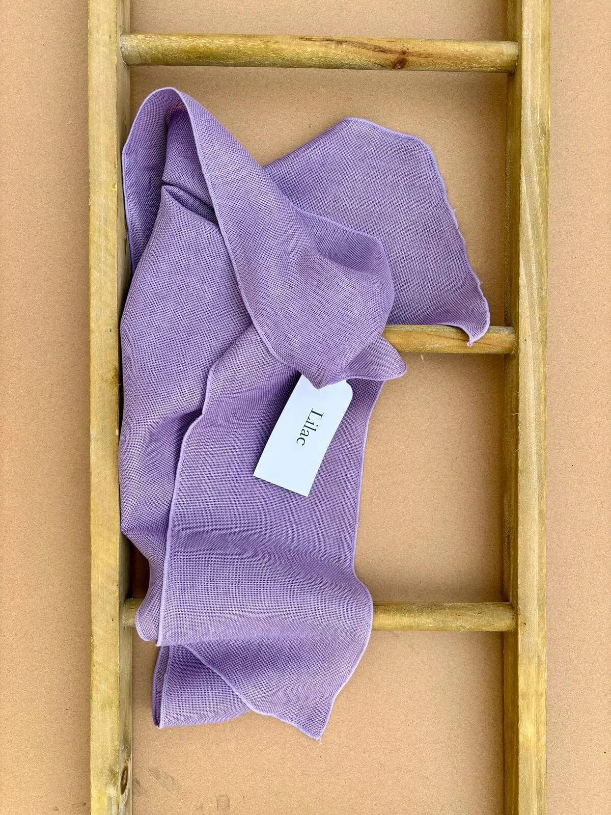 Hire linen chair sashes for weddings and events, available in a selection of colours and professionally fitted in various styles. Co-ordinating linen table runners also available.