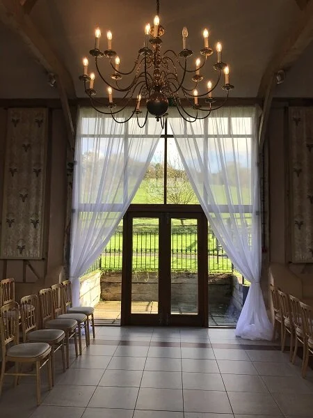 upwaltham barns window draping ceremony wedding sussex surrey kent and hampshire