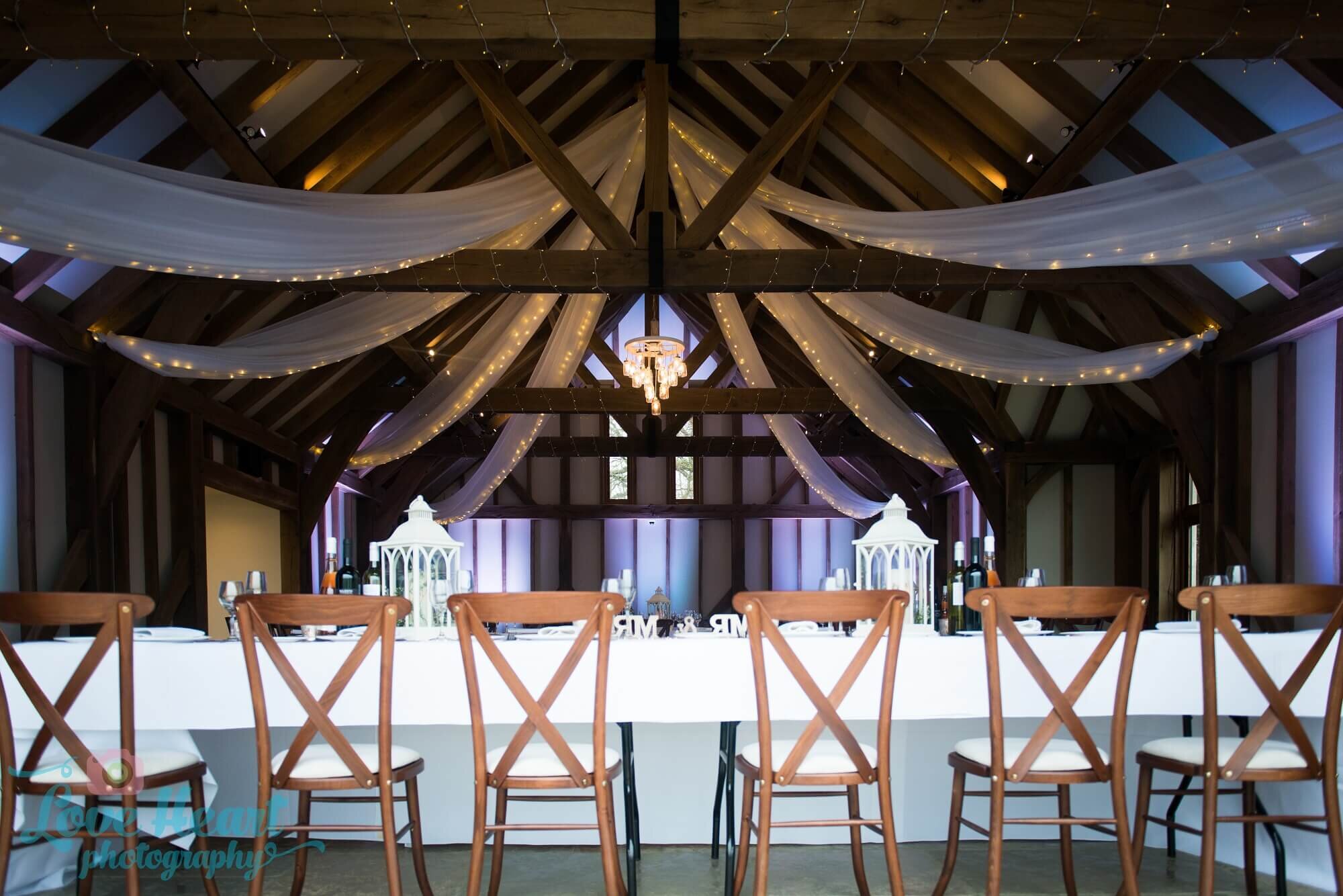 draping canopy with lights and chandelier at Brookfield Barn