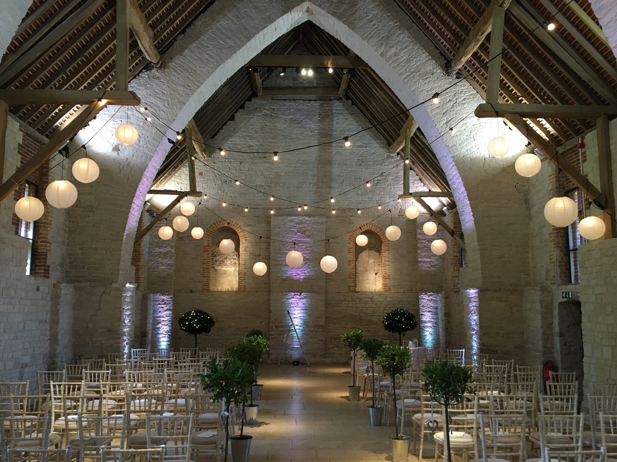 festoon lights and pendants with hanging lanterns at tithe barn petersfield