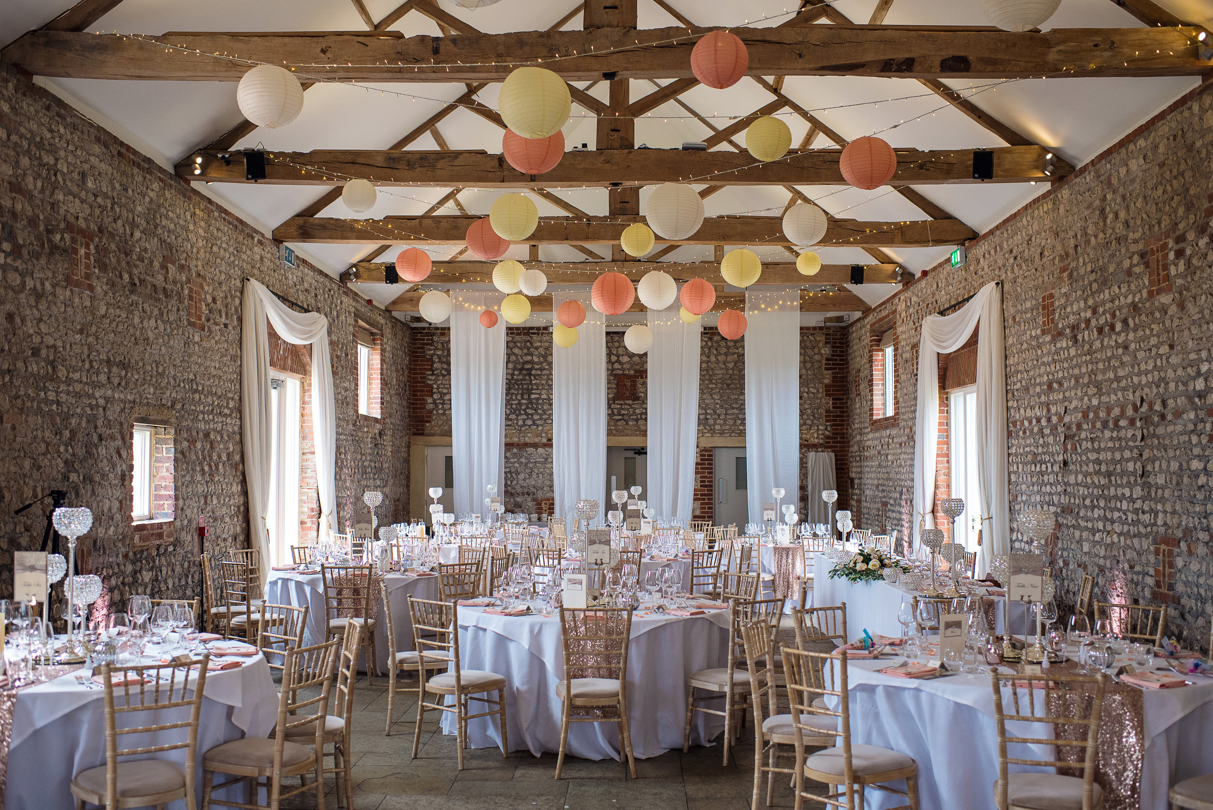 glam, peach and crystal decor including hanging lanterns at farbridge