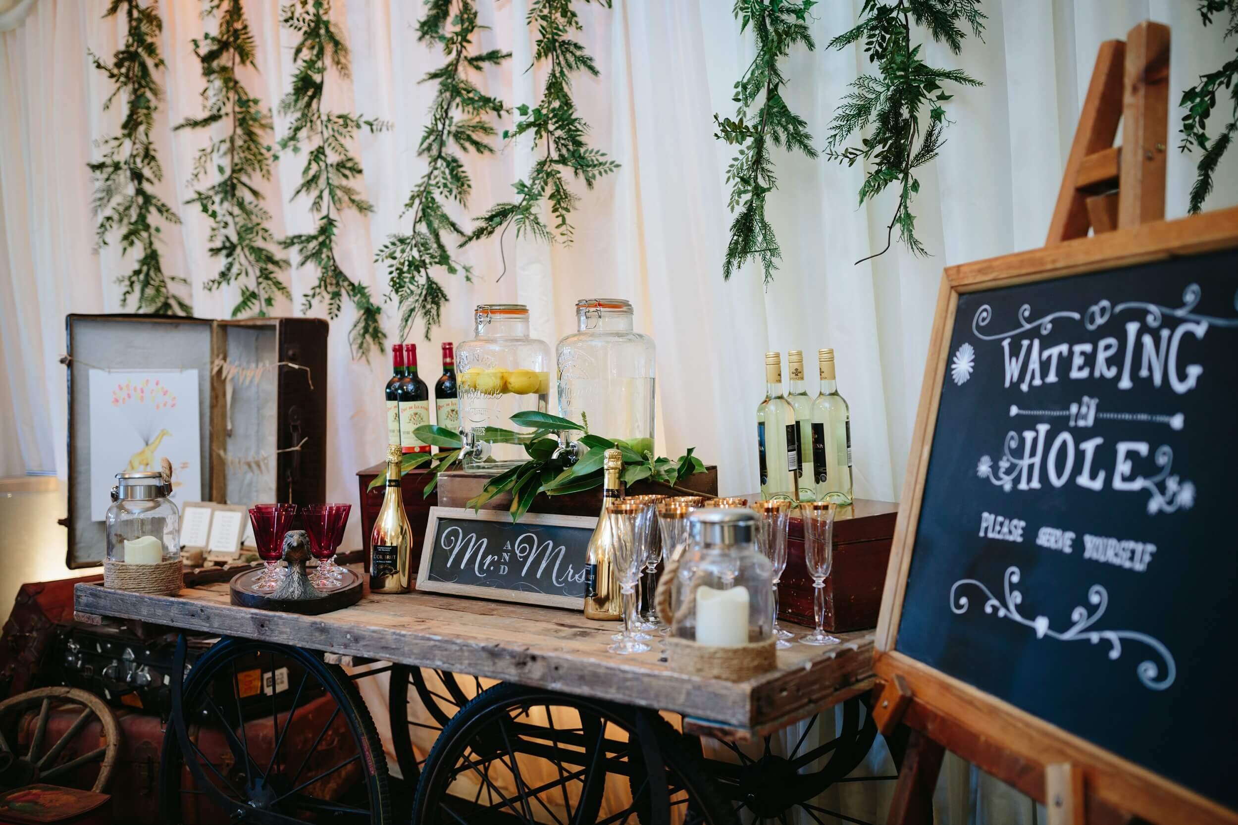 quirky drinks station on rustic wagon, south african styled wedding at selden barns