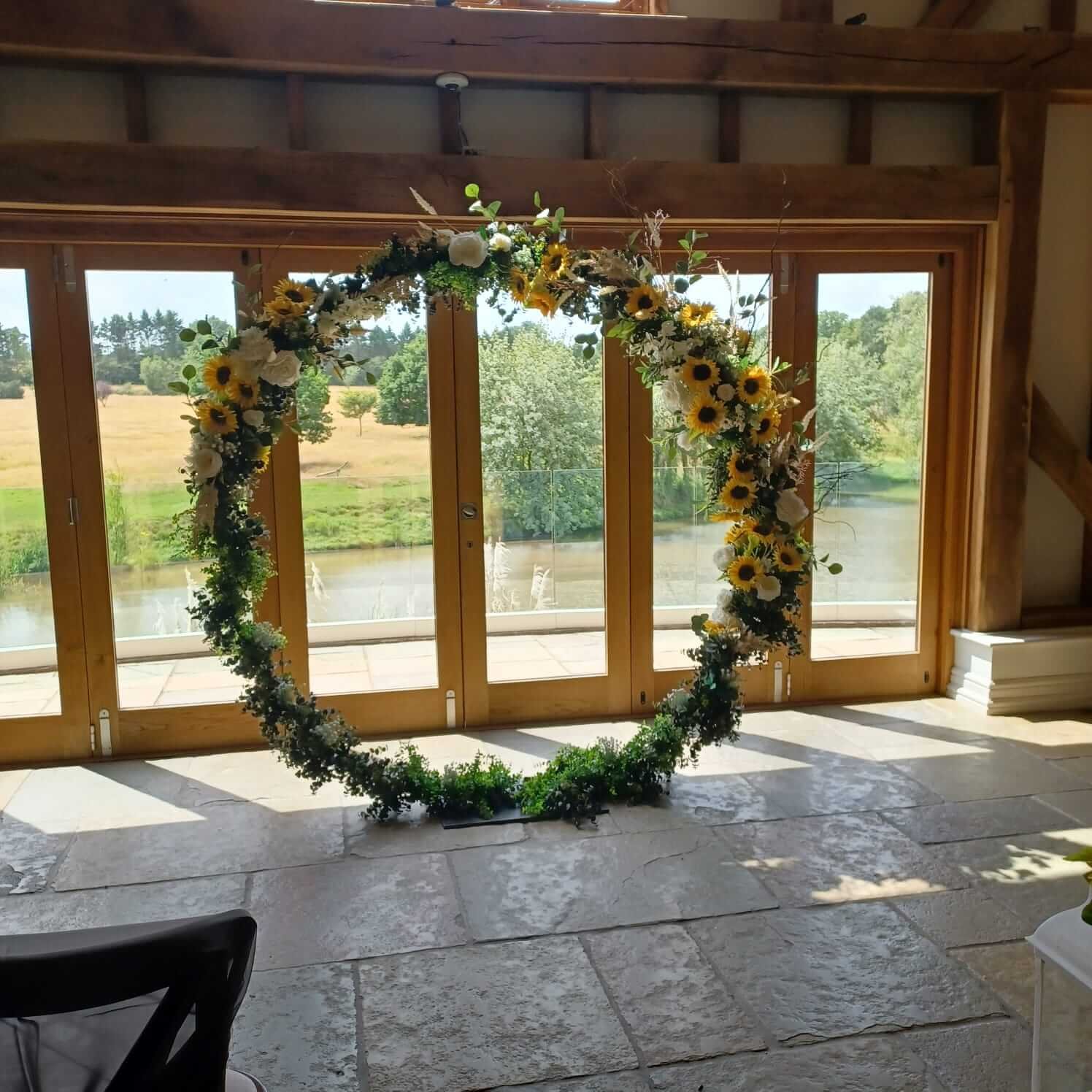 moongate_arch_sunflowers_brookfield_barn_faux_florals.jpg