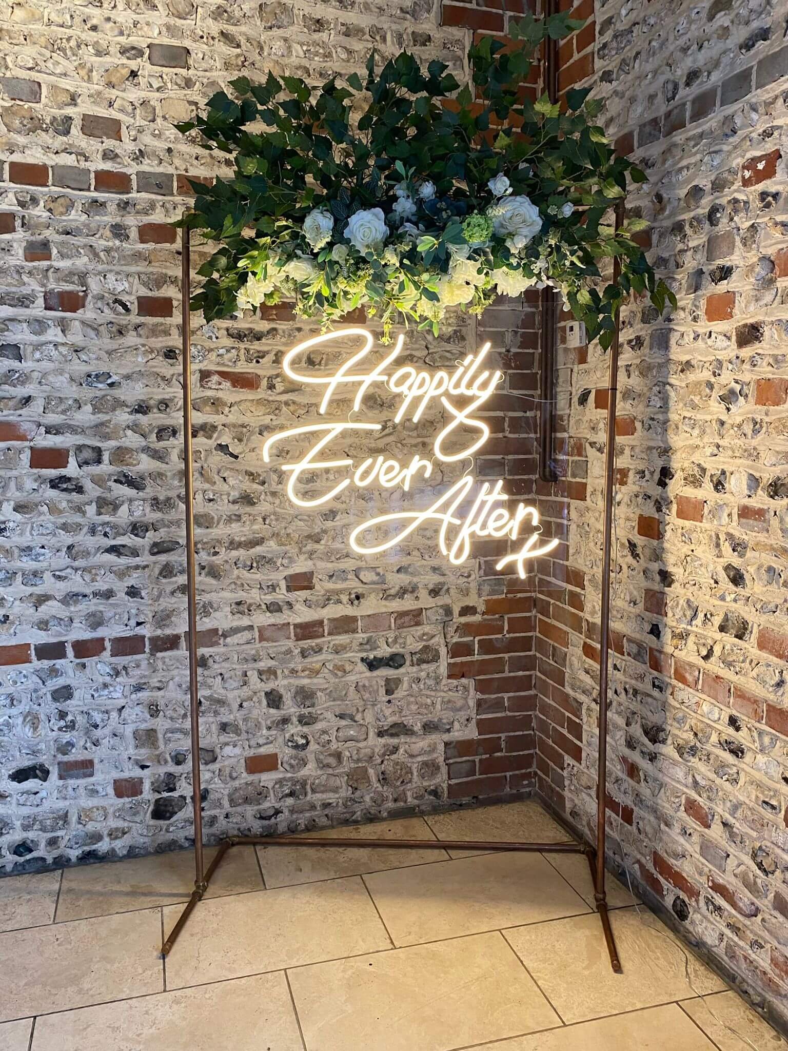 Happily_ever_after_wedding_neon_upwaltham_barns_fauxflorals_sussex.jpg