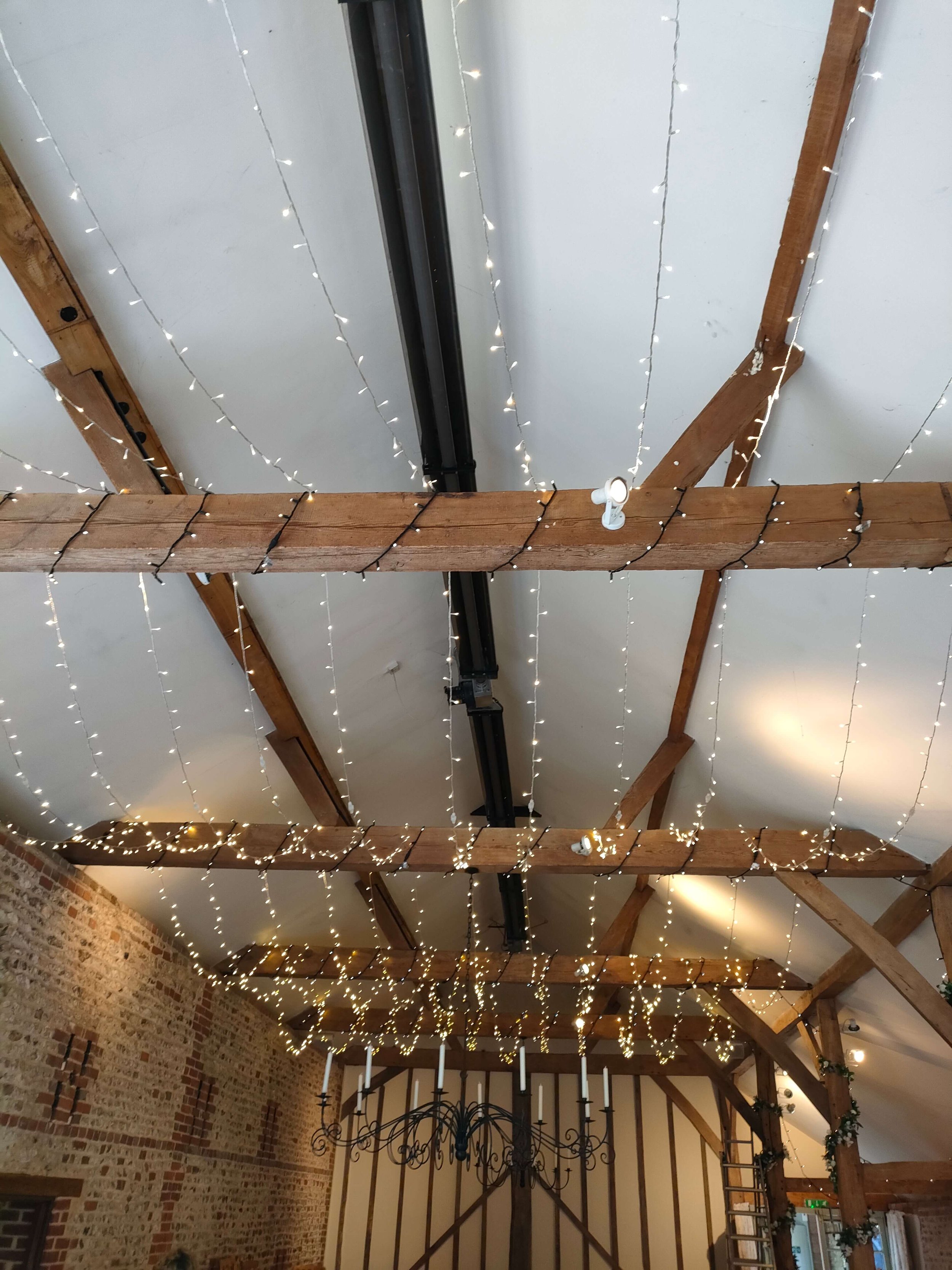 Upwaltham_barns_fairy_light_ceiling_sc.jpg