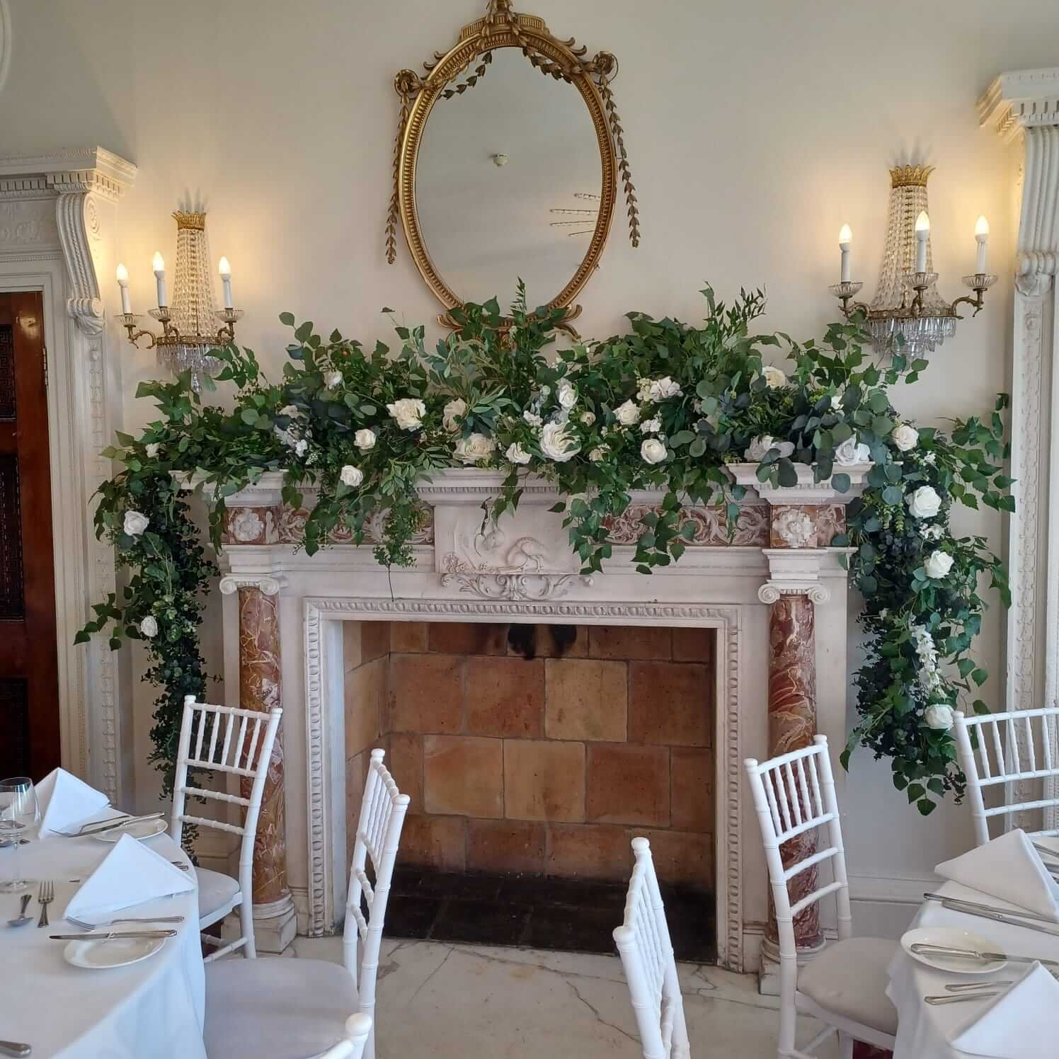 buxtedpark_fireplace_florals_reception_wedding_sussex_decor_hire.jpg