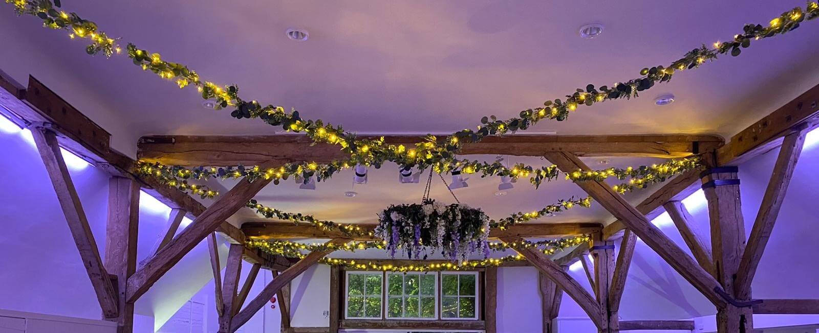 Burymanorbarn_fairylight_foliage_ceiling_decor_wedding crop.jpg