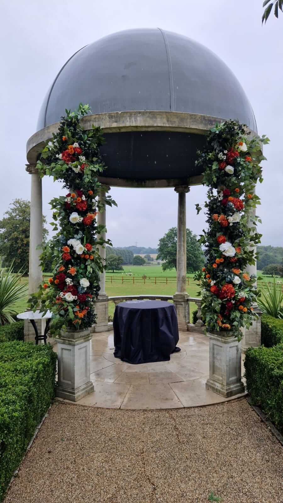 Froyle_park_wedding_outside_arch_fauxflorals.jpg
