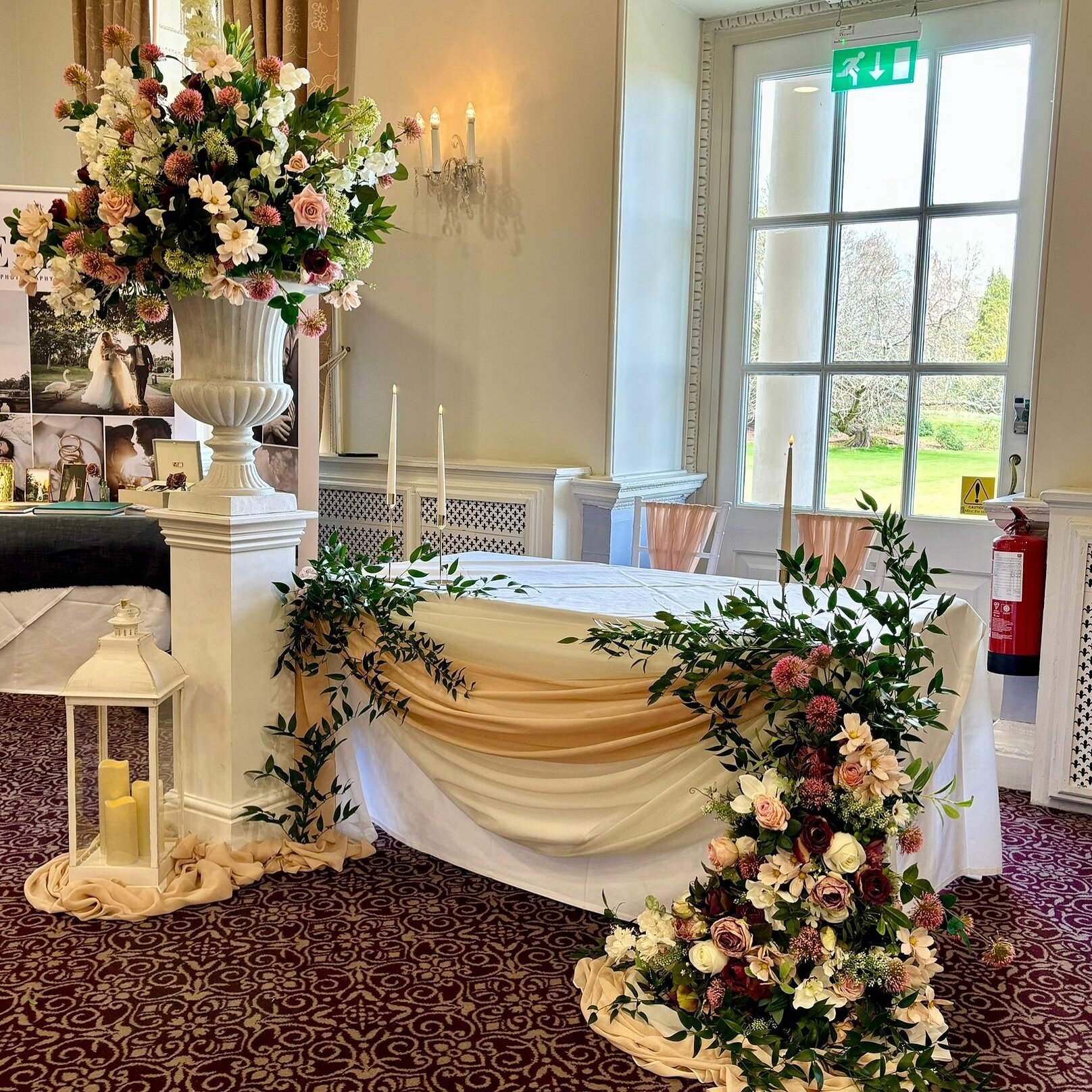 Gorgeous ceremony table @buxtedparkhotel with faux florals and fresh ruscus styled by our team 🌿🌹

Have you thought how&rsquo;d you style your ceremony table? Get in touch and see how we can help 💕

.
.
.
.
.
.
.
#weddingceremonydecor #weddingidea