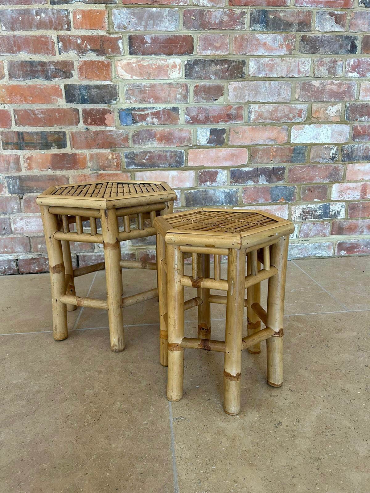 Bamboo Hexagonal SideTables x 2 — Default — C.2 shown as two different height hexagonal bamboo side tables on tiled floor with brick wall background.