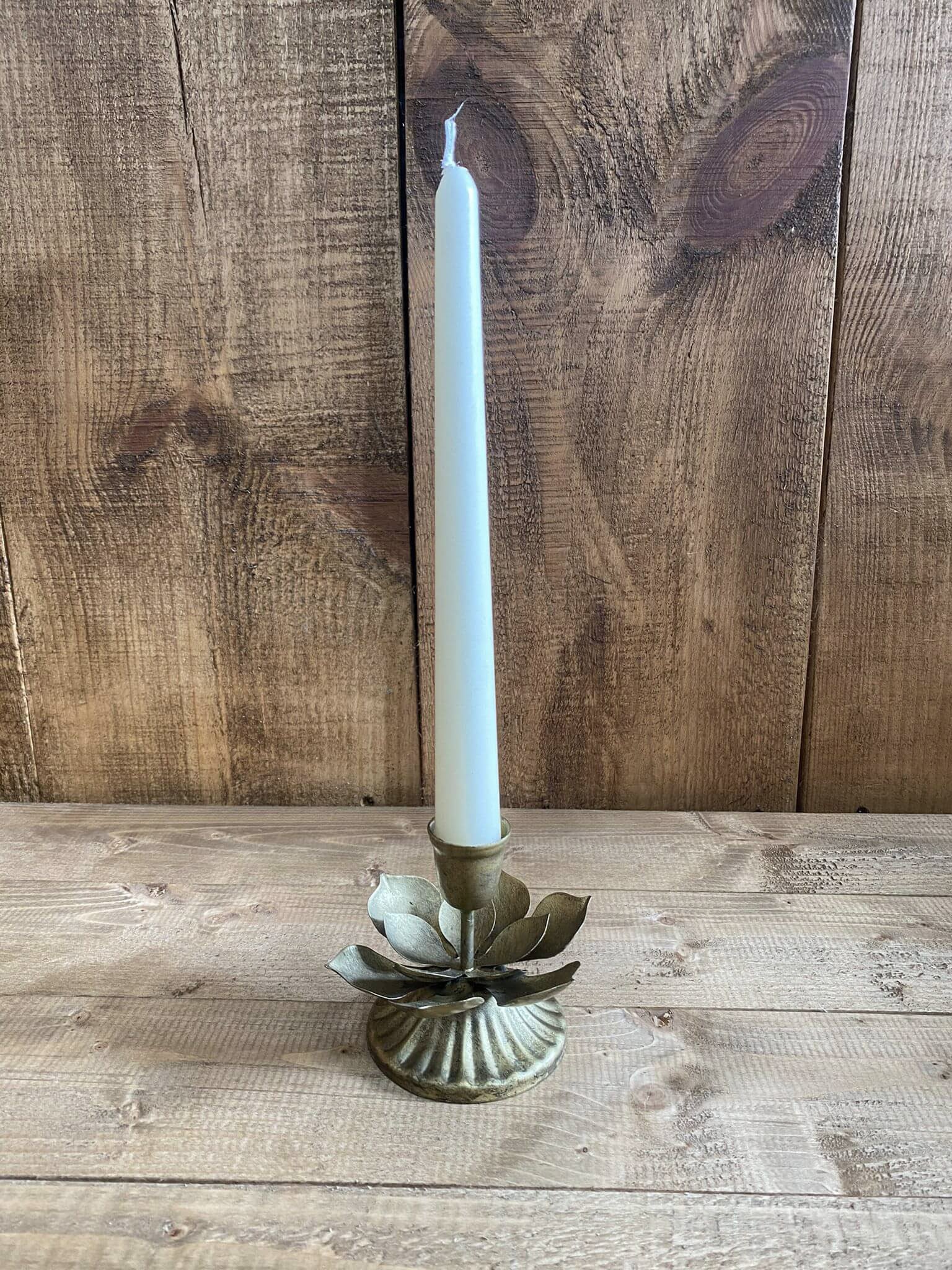 Lotus Flower Candlestick Holder - 10x9x8.5cm with white taper candle, available to hire for your wedding or event.