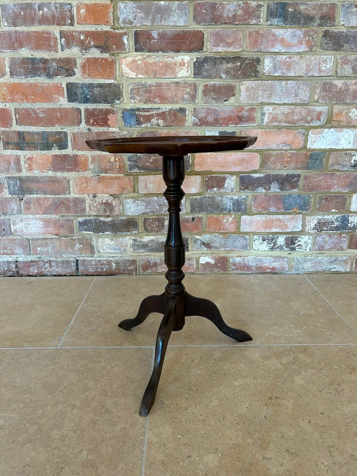 Antique Hexagonal Side Table - 21 inches high - 13inch top, dark wood with turned pedestal and three curved legs, available to hire for your wedding or event.
