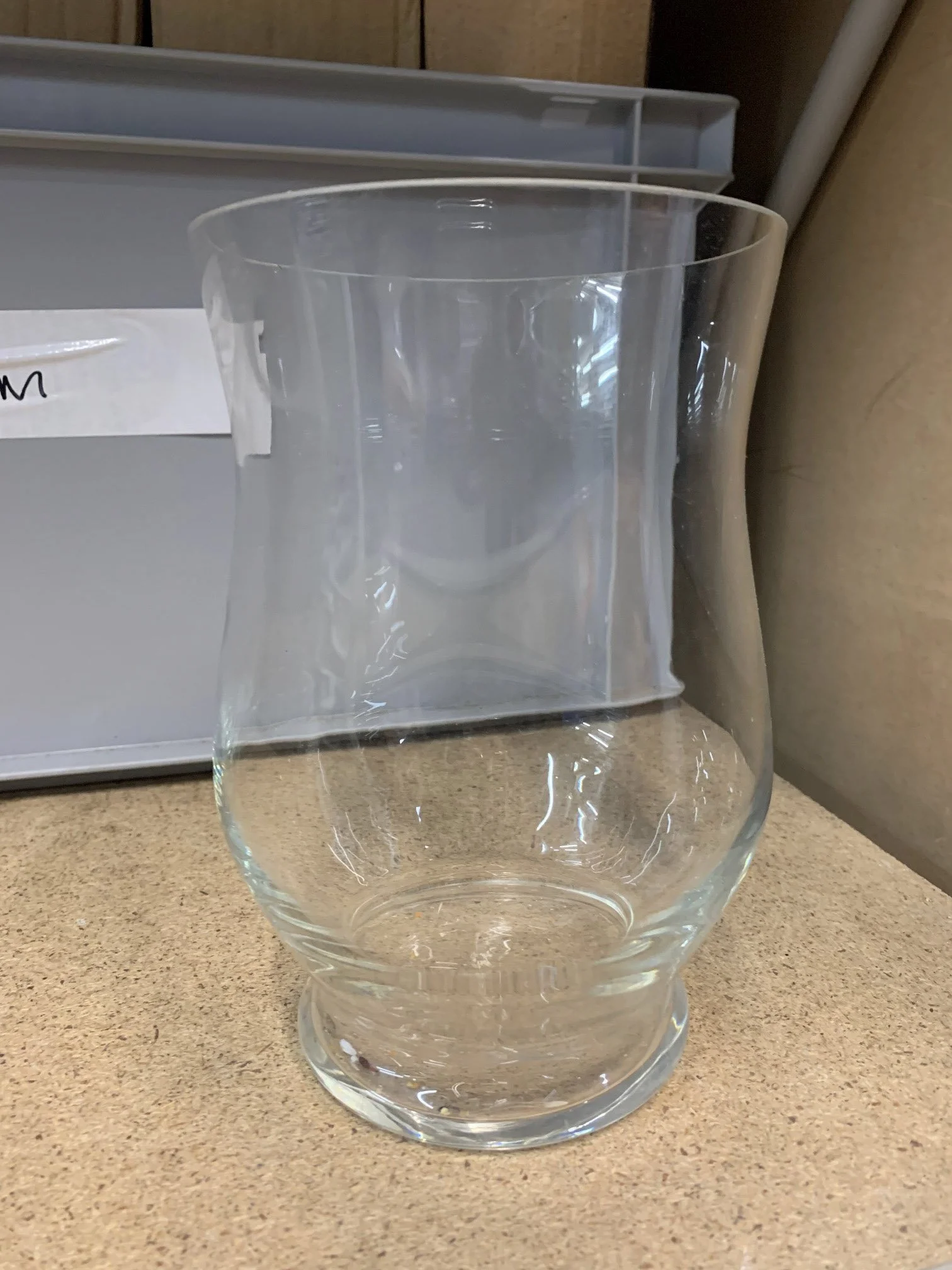 Hurricane Vase - Large - 38cm clear glass with flared top and rounded base, available to hire for your wedding or event.