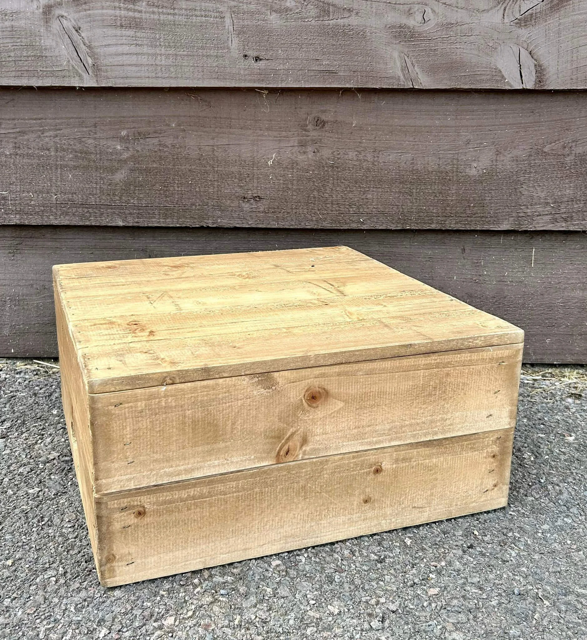 Rustic Wooden Cake Crate - 41cm square, a square rustic wooden crate with natural wood grain and knots, available to hire for your wedding or event.