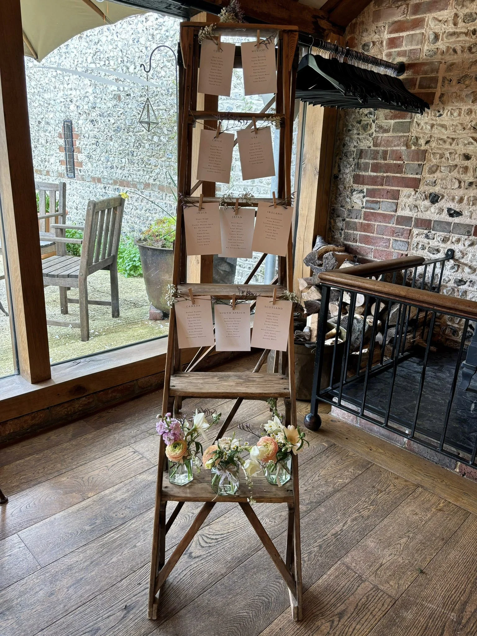 Step Ladder - Rustic - Extra Large with clipped paper cards and floral decorations, available to hire for your wedding or event.