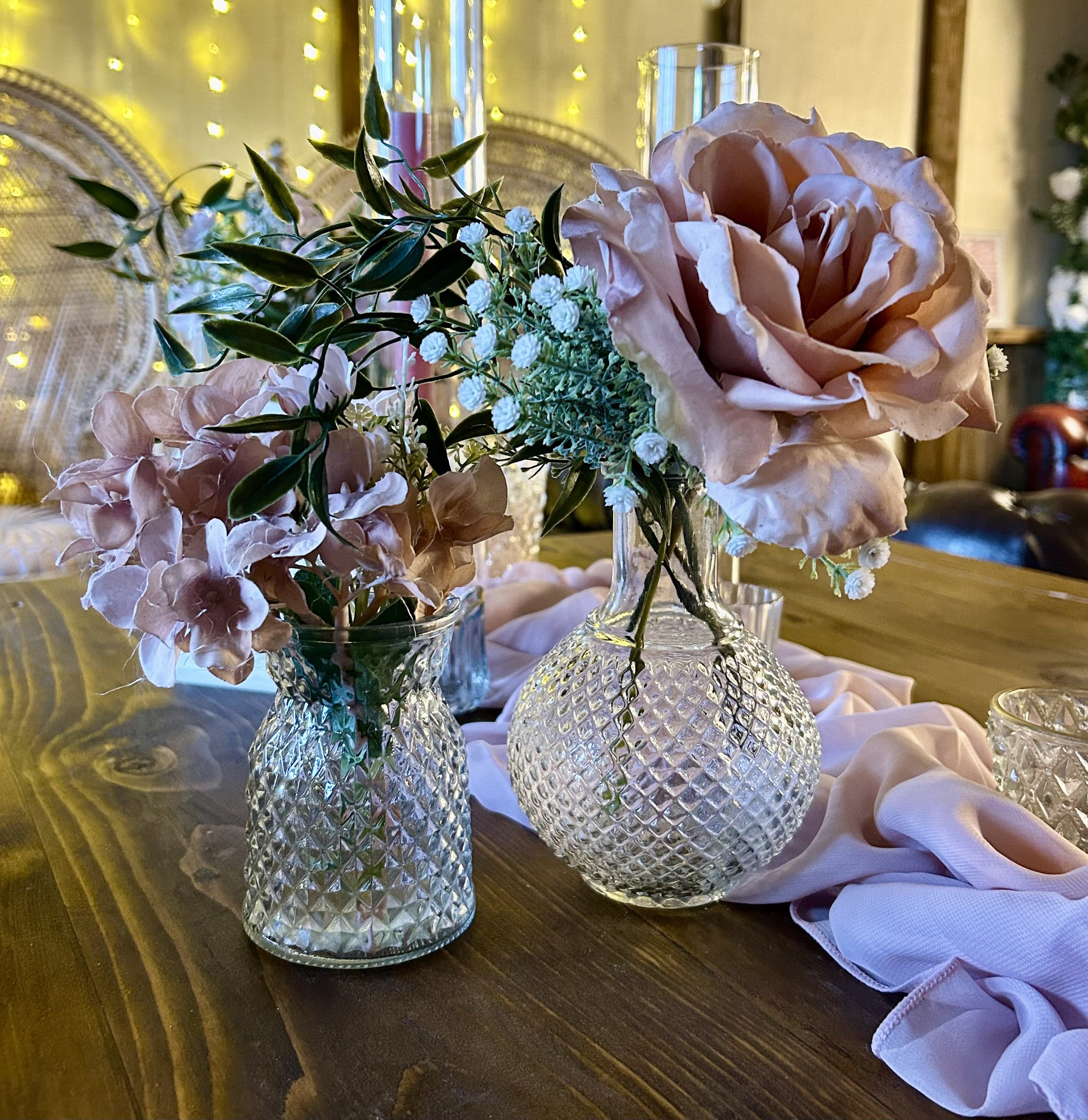 Vintage Bud Vase - 10cm clear textured glass vase with pink and white faux flowers, available to hire for your wedding or event