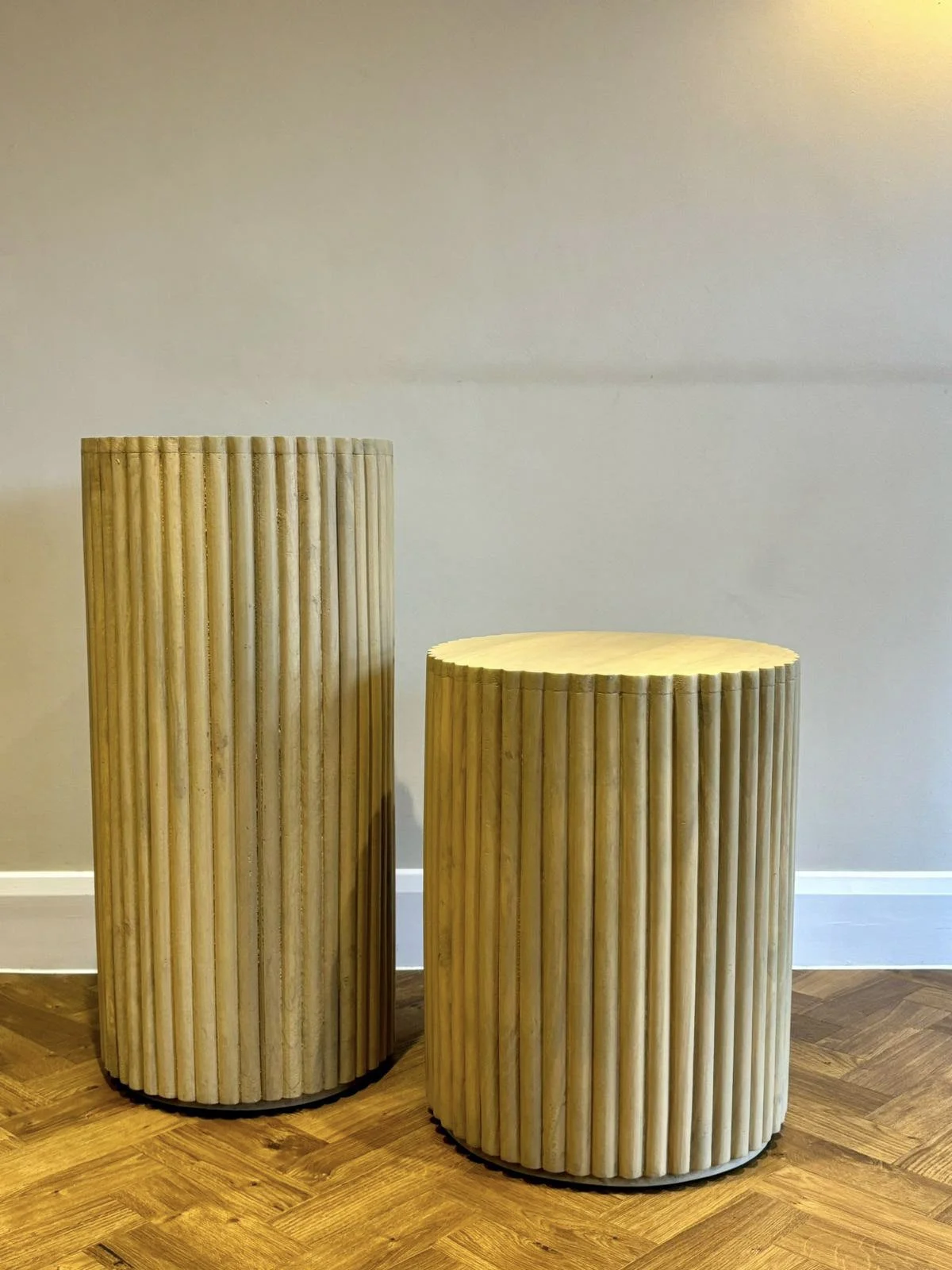 Ridged Plinth Natural - Medium 52cm x 40cm shown with a shorter plinth, available to hire for your wedding or event.