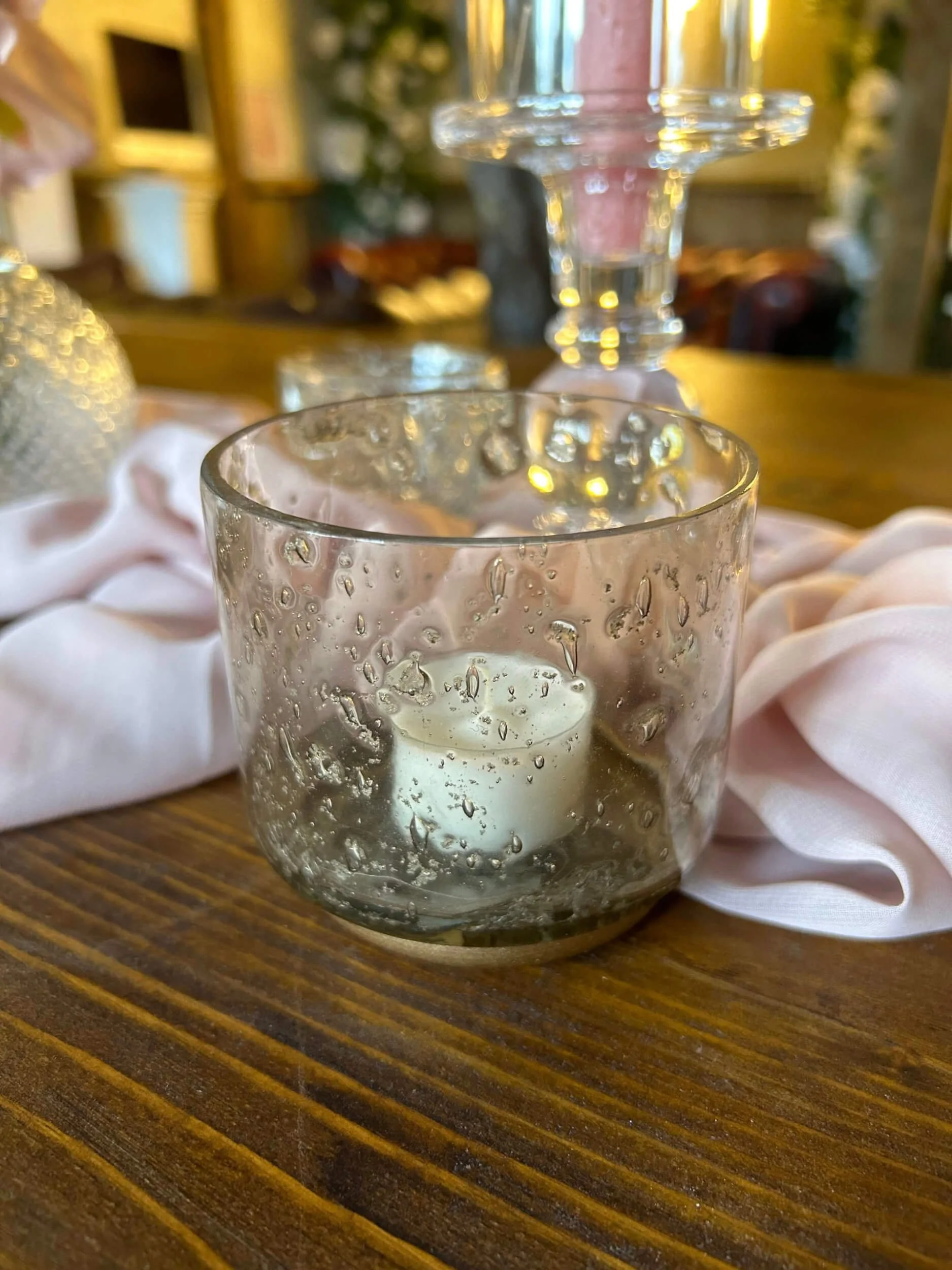 Tealight - Smoke textured glass tealight holder with white candle inside, available to hire for your wedding or event.