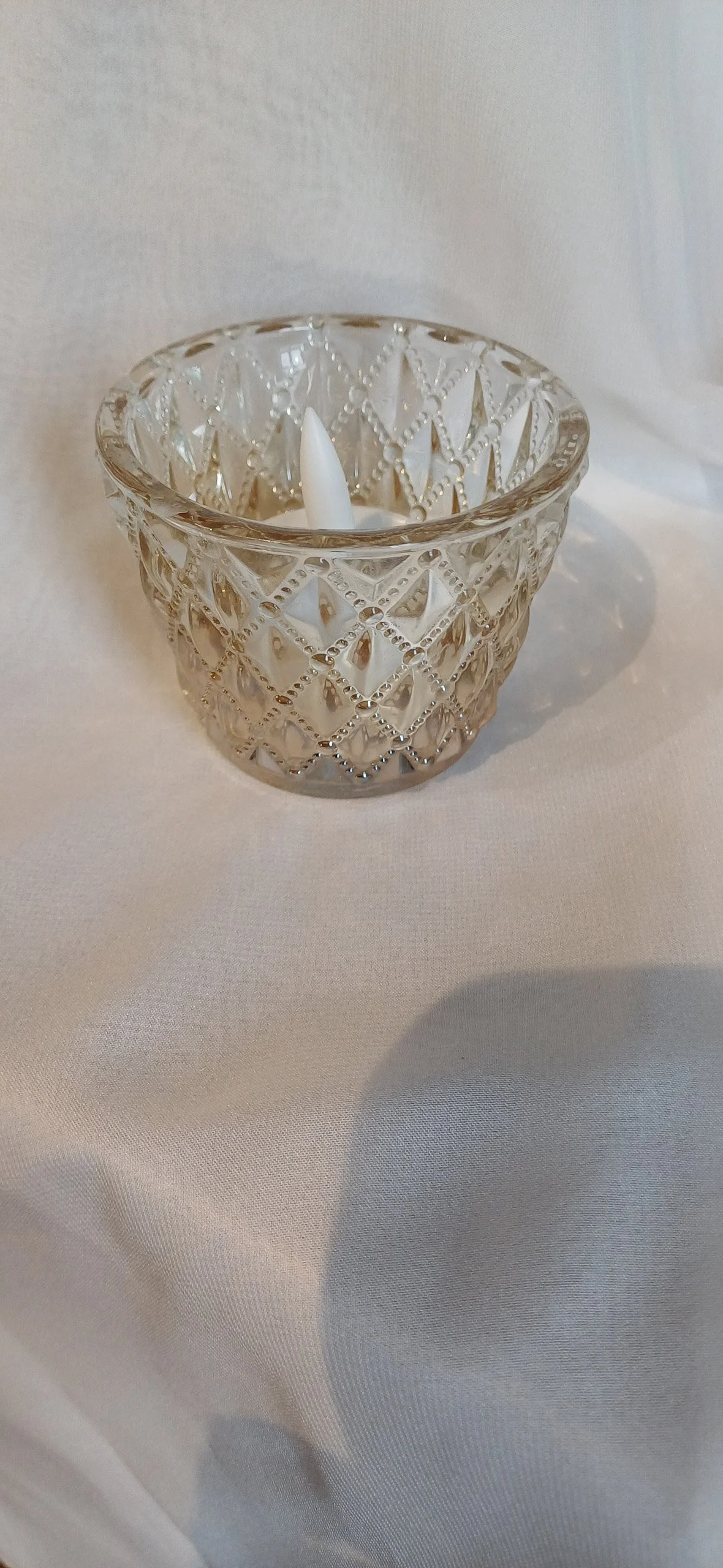 Antique Gold Tealight - Small with diamond pattern and white LED candle, available to hire for your wedding or event.