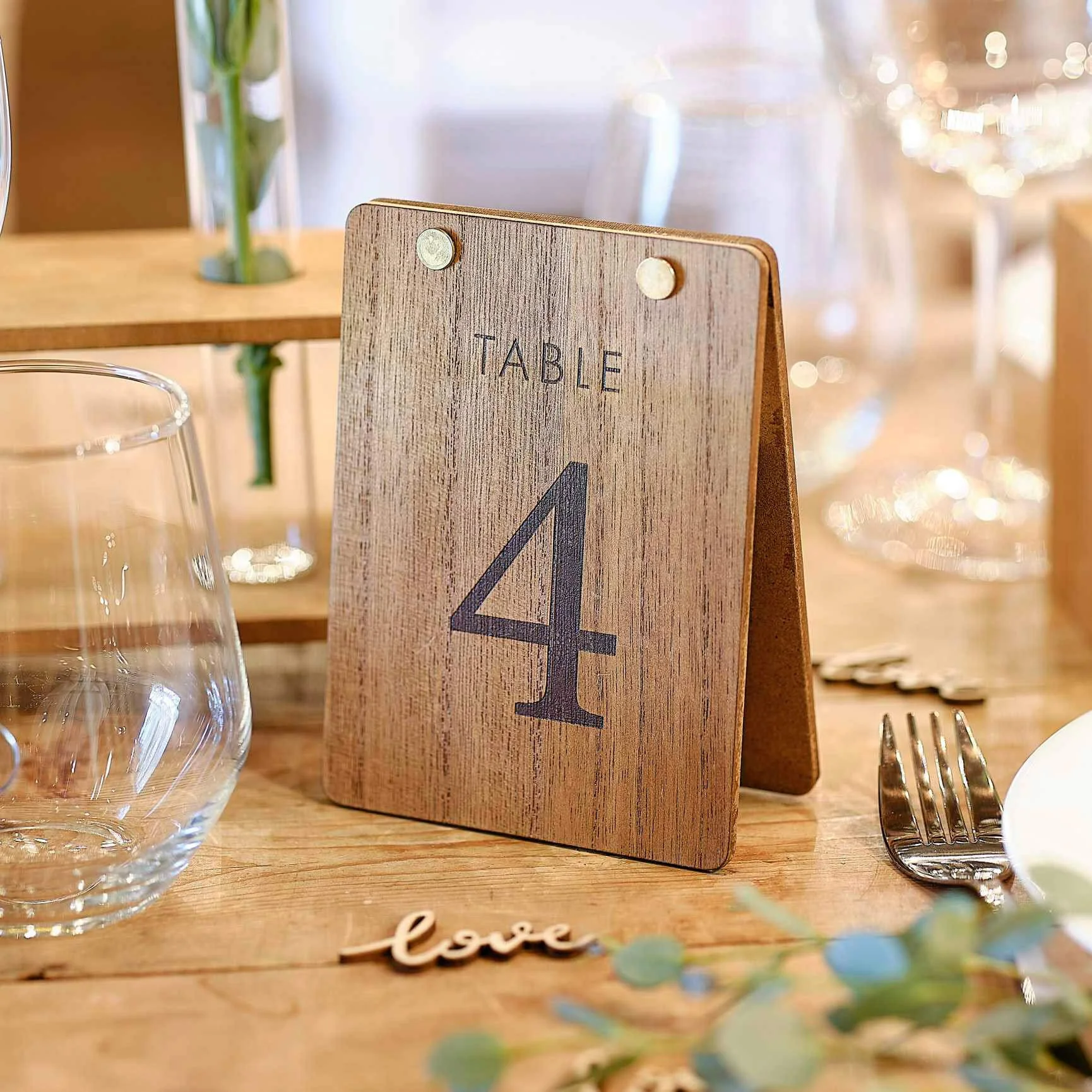 Rustic A Frame Table Numbers 1 to 12 Boxed Set featuring a wooden table number 4, available to hire for your wedding or event.